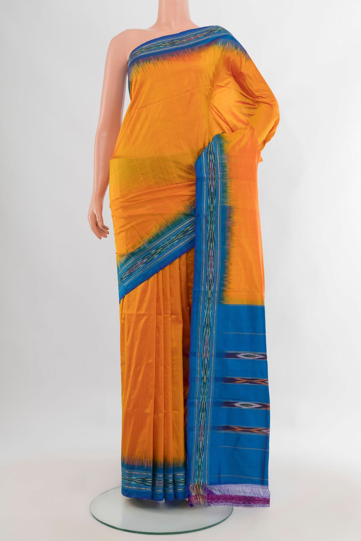 Pure Silk Yellow Pochampally Saree with Plain Body and Ikat Border.  displayed on a mannequin