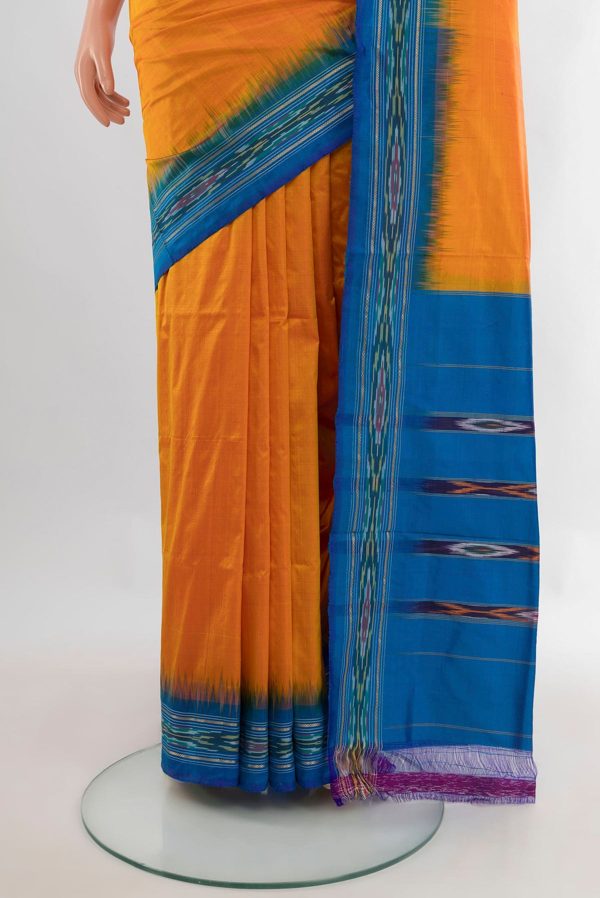 Pleats and pallu of Pure Silk Yellow Pochampally Saree with Plain Body and Ikat Border. 