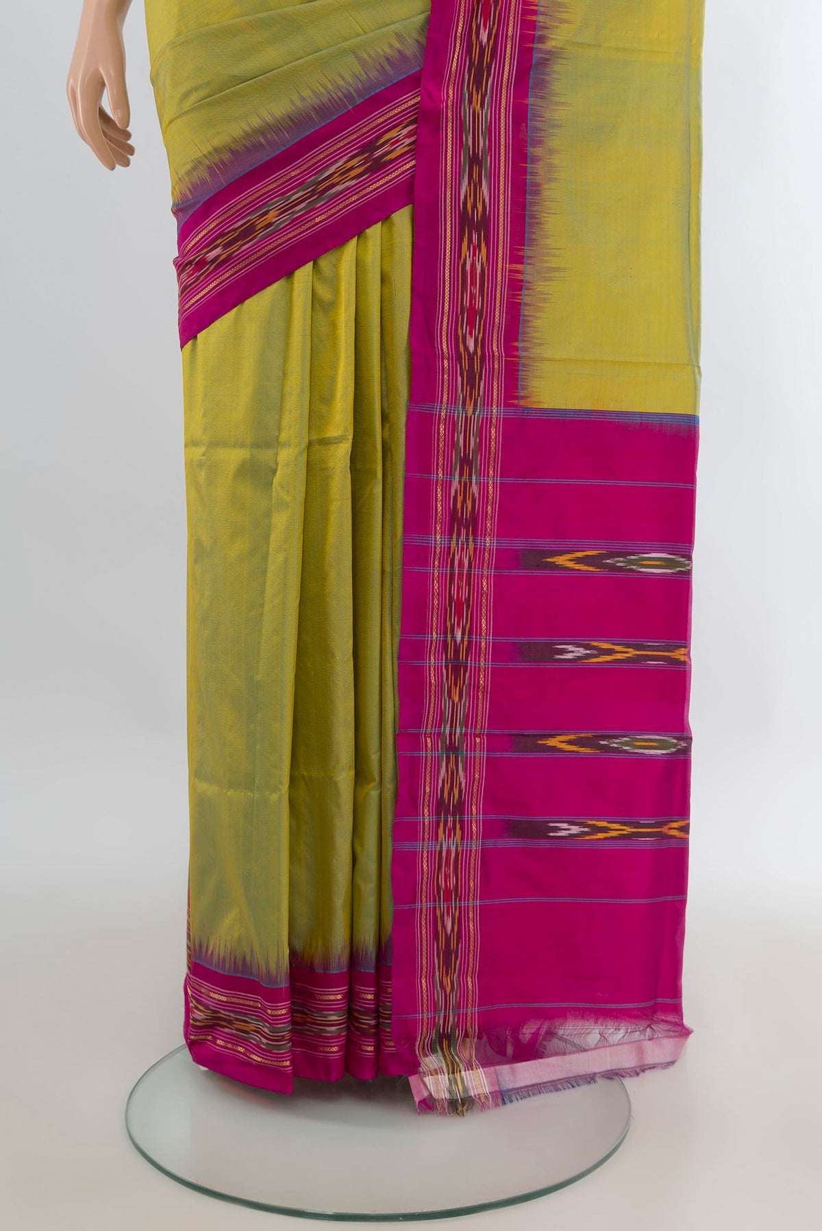 Pleats and pallu of Pure Silk Acid Green Pochampally Saree with Plain Body and Ikat Border. 