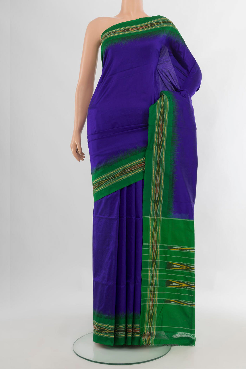Pure Silk Dark Blue Pochampally Saree with Plain Body and Ikat Border.  displayed on a mannequin