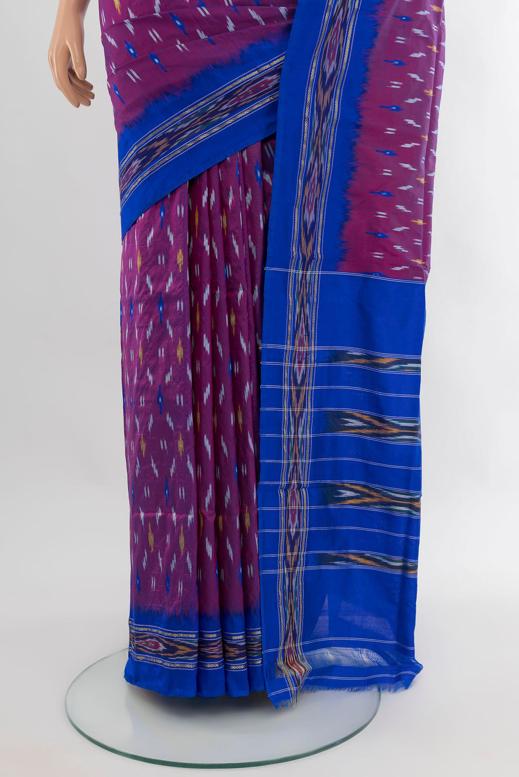 Pleats and pallu of Purple Pochampally Silk Saree with Ikat design on the body and Ikat Border. 