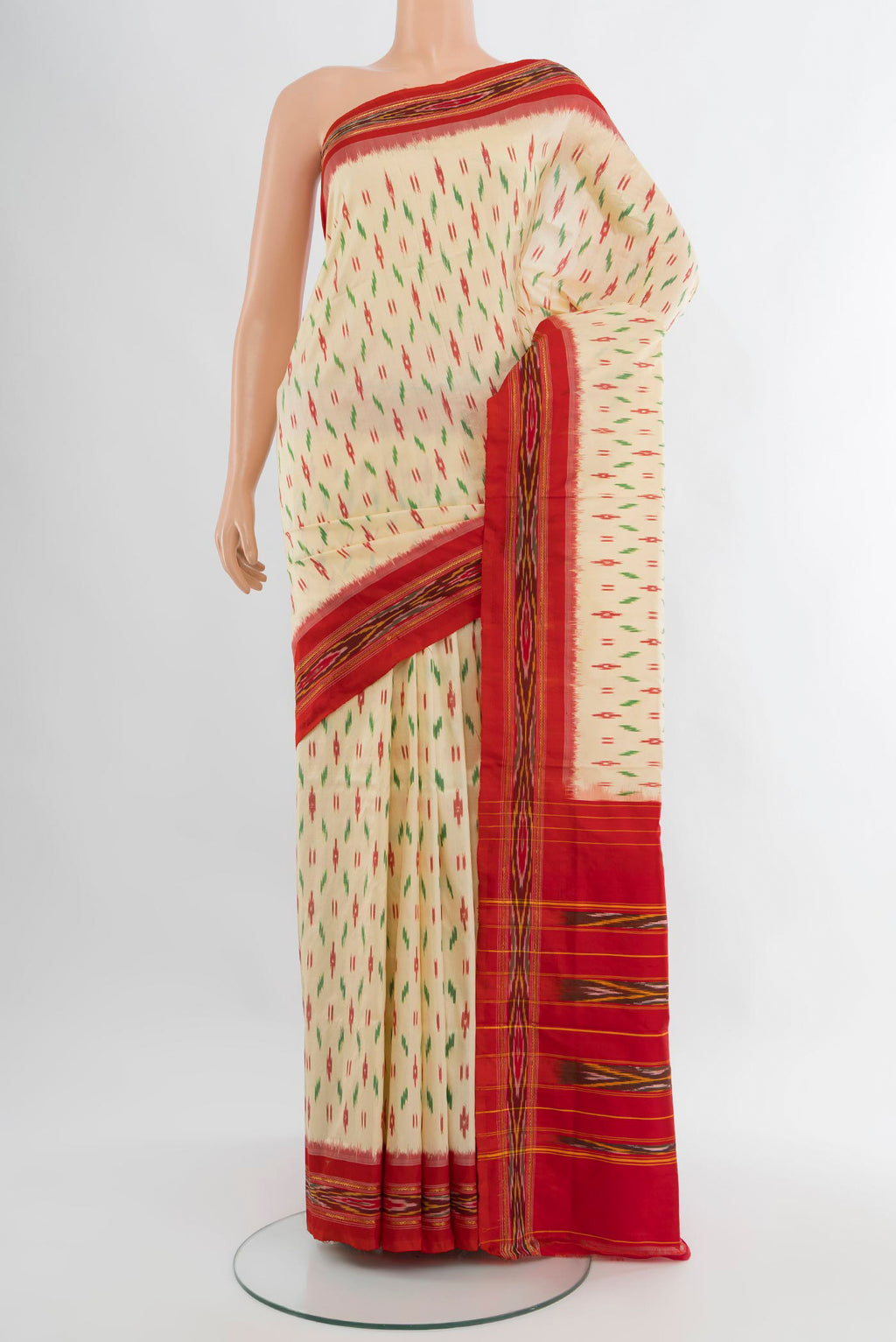Cream Pochampally Silk Saree with Ikat design on the body and Ikat Border.  displayed on a mannequin