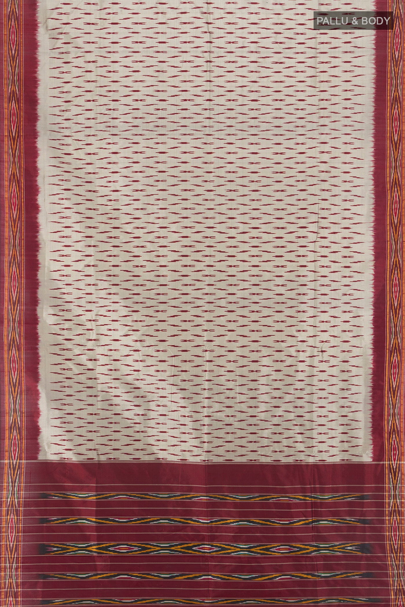 Flat view of Davys Grey Pochampally Silk Saree with Ikat design on the body and Zari Border. 