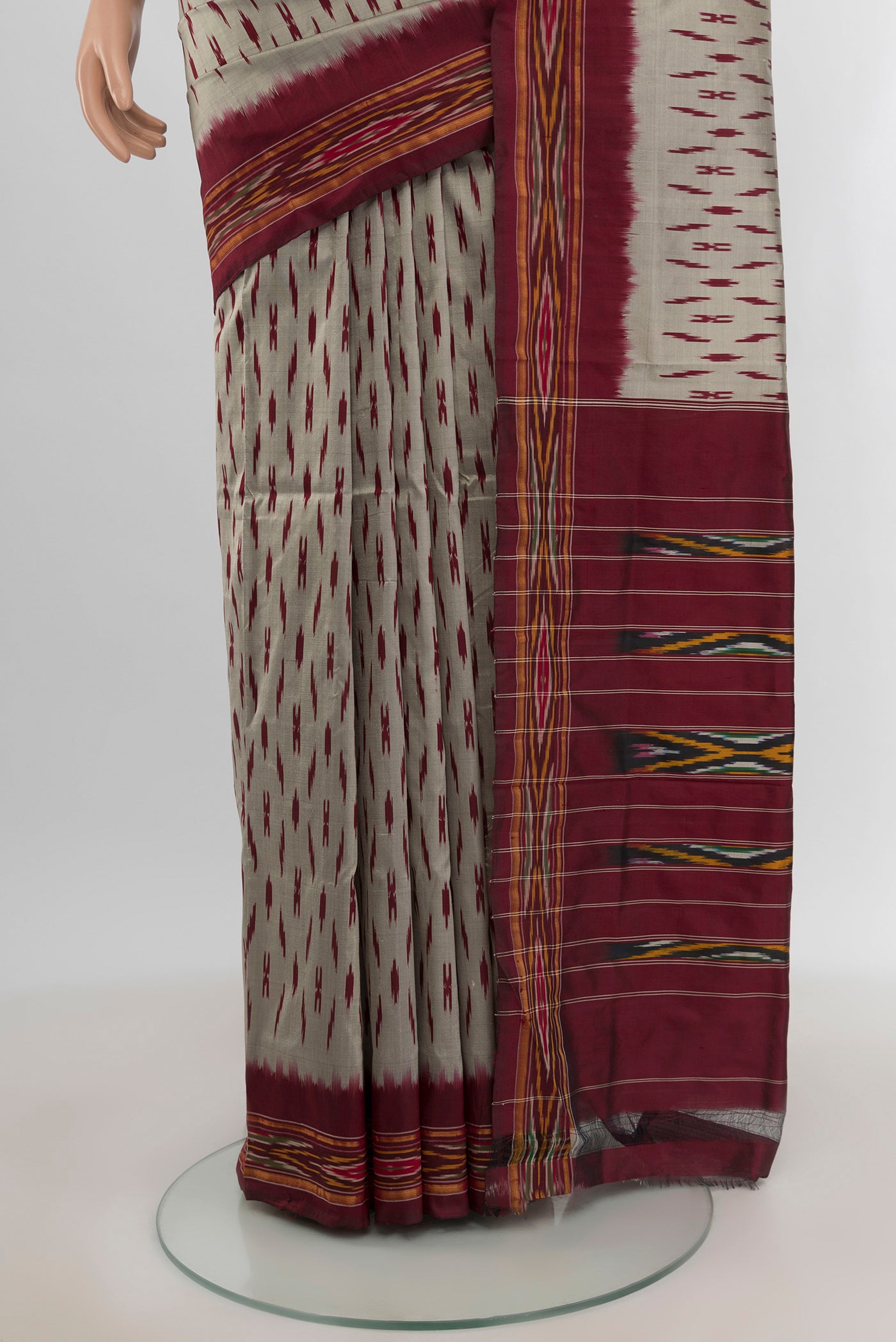 Pleats and pallu of Davys Grey Pochampally Silk Saree with Ikat design on the body and Zari Border. 