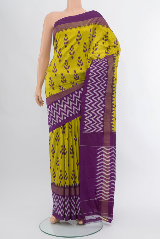 Light Green Pochampally Saree with Ikat Print on the body and Silk Border.  displayed on a mannequin