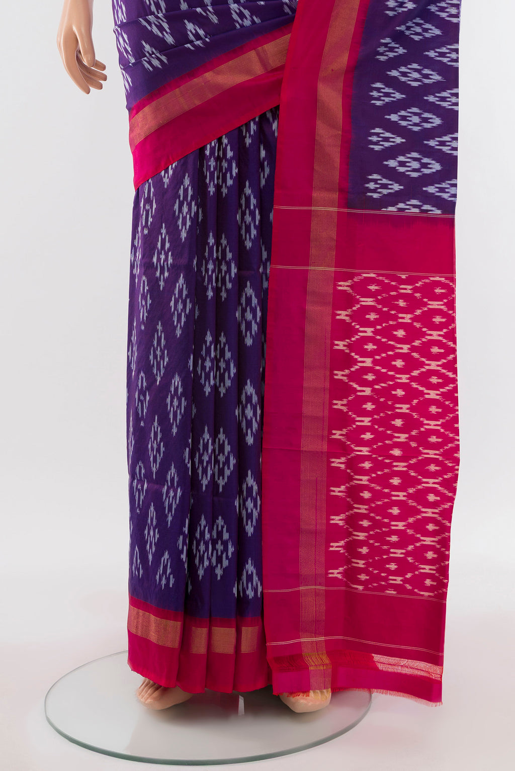 Pleats and pallu of Dark Blue Rajkot Patola Silk Saree with Ikat Print on the body and Silk Border. 