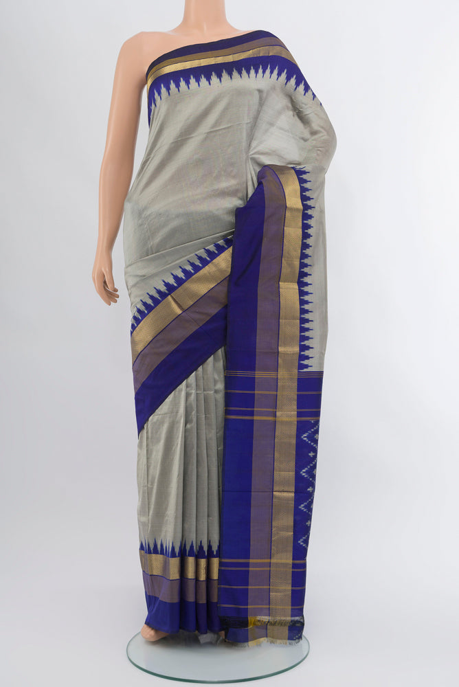 Grey Pochampally Saree with Ikat Print on the body and Silk Border.  displayed on a mannequin