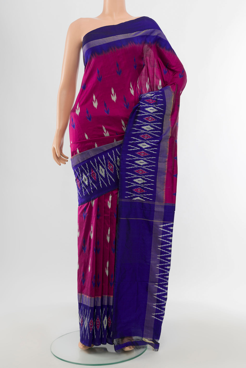 Multi Color Pochampally Saree with Ikat Print on the body and Silk Border.  displayed on a mannequin