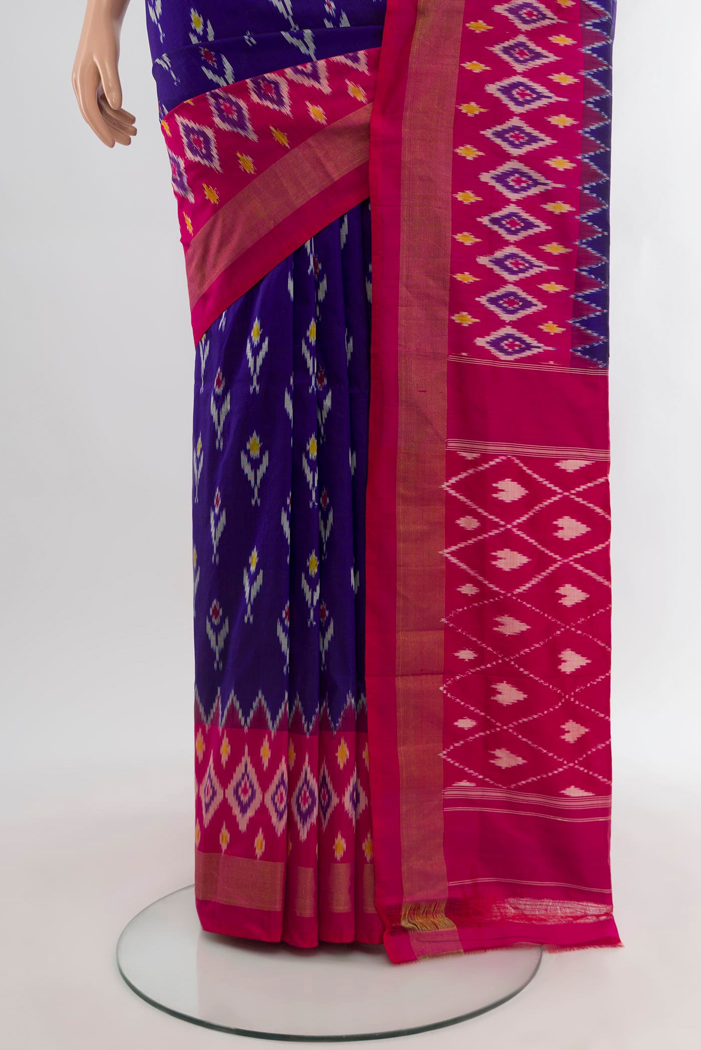 Pleats and pallu of Dark Blue Pochampally Silk Saree with Ikat design on the body and Ikat Border. 