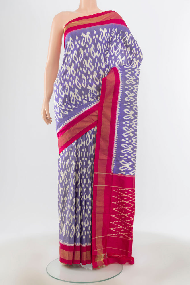 Multi Color Pochampally Saree with Ikat Print on the body and Silk Border.  displayed on a mannequin