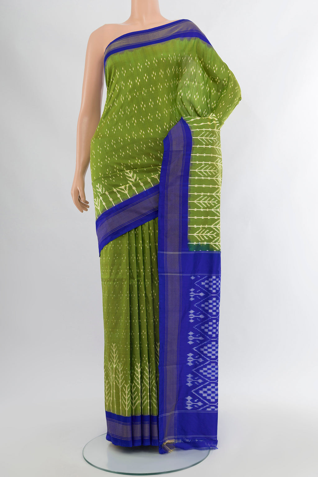 Parrot Green Pochampally Silk Saree with Ikat Print on the body and Silk Border.  displayed on a mannequin