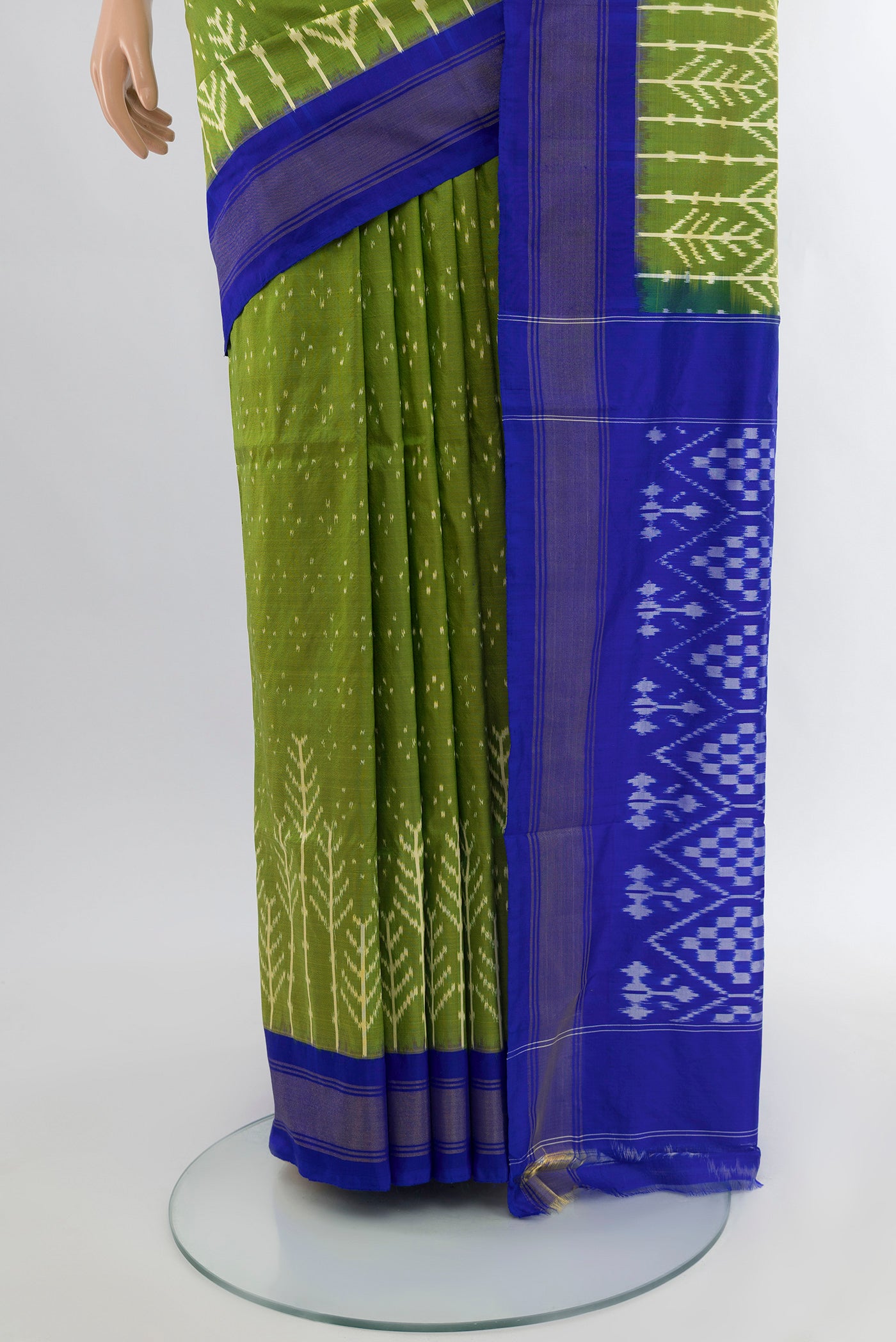 Pleats and pallu of Parrot Green Pochampally Silk Saree with Ikat Print on the body and Silk Border. 