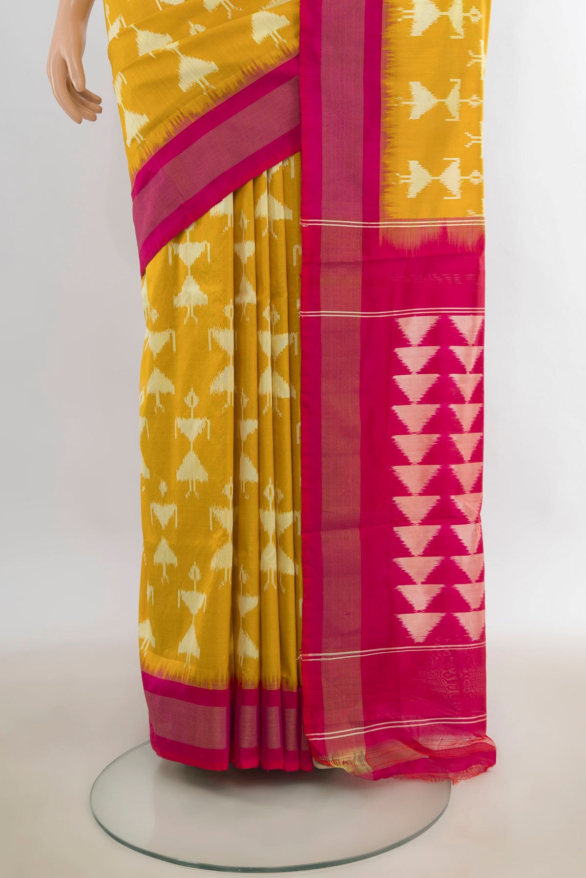 Pleats and pallu of Pure Silk Yellow Pochampally Saree with Ikat design on the body and Zari Border. 