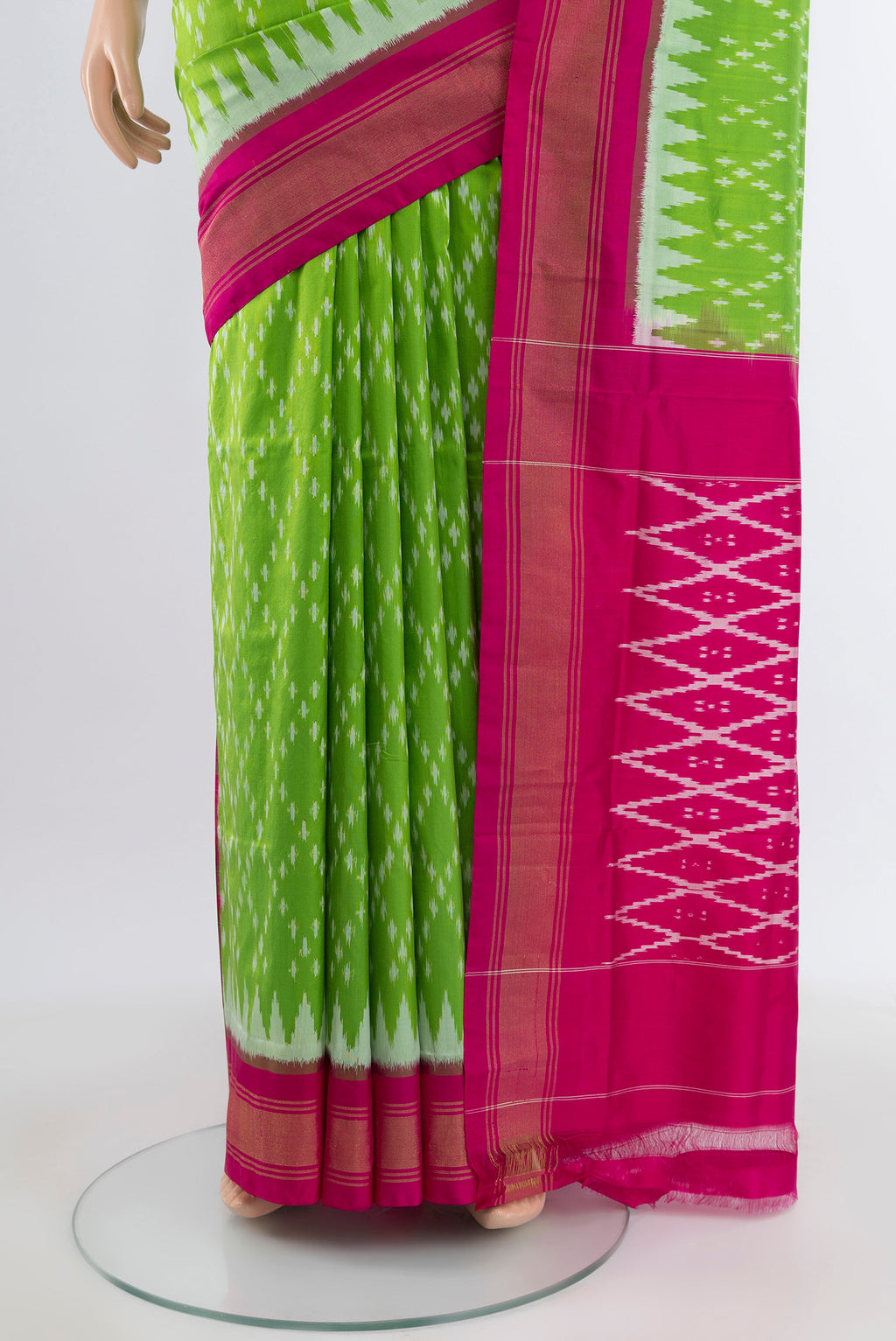 Pleats and pallu of Parrot Green Pochampally Silk Saree with Pure Ikat on the body and Zari Border. 