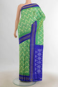 Pure Silk Multi Color Pochampally Saree with Ikat Print on the body and Silk Border.  displayed on a mannequin