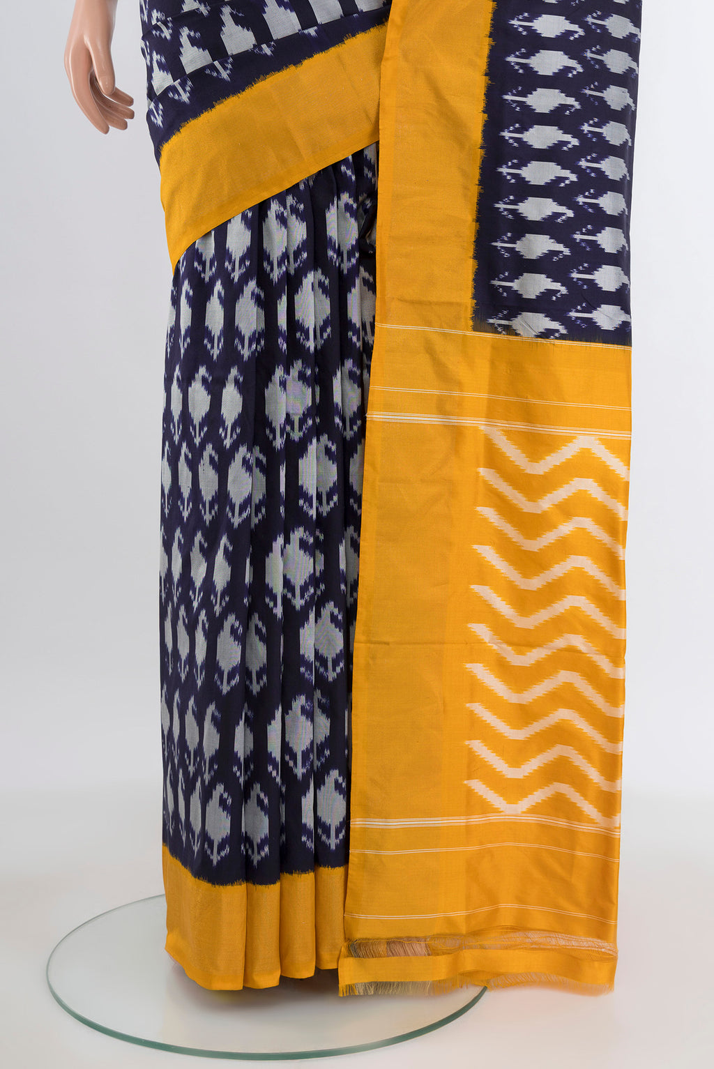 Pleats and pallu of Navy Blue Pochampally Silk Saree with Pure Ikat on the body and Plain Border. 
