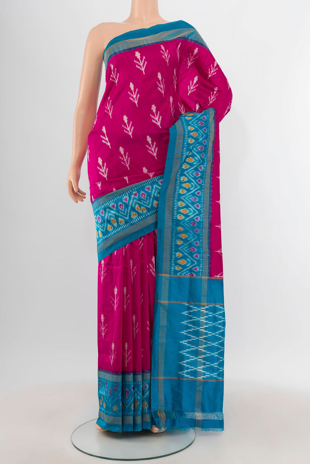 Pink Pochampally Silk Saree with Pure Ikat on the body and Ikat Border.  displayed on a mannequin