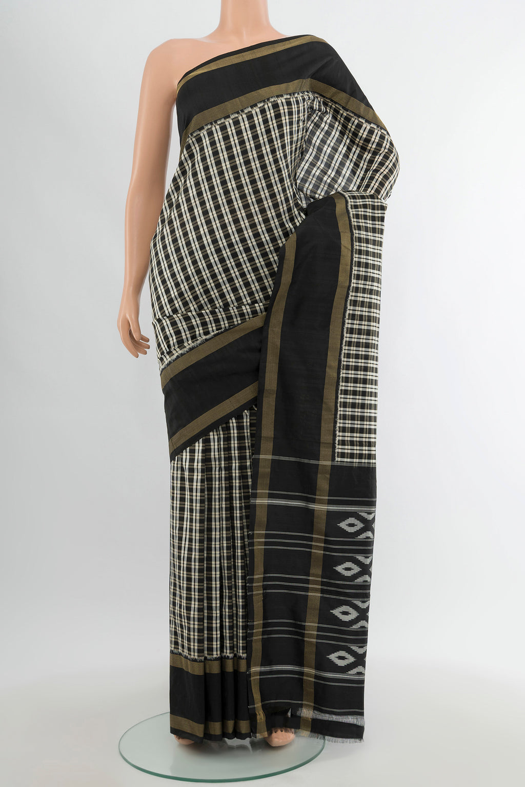 Multi Color Pochampally Silk Saree with Checked design on the body and Zari Border.  displayed on a mannequin