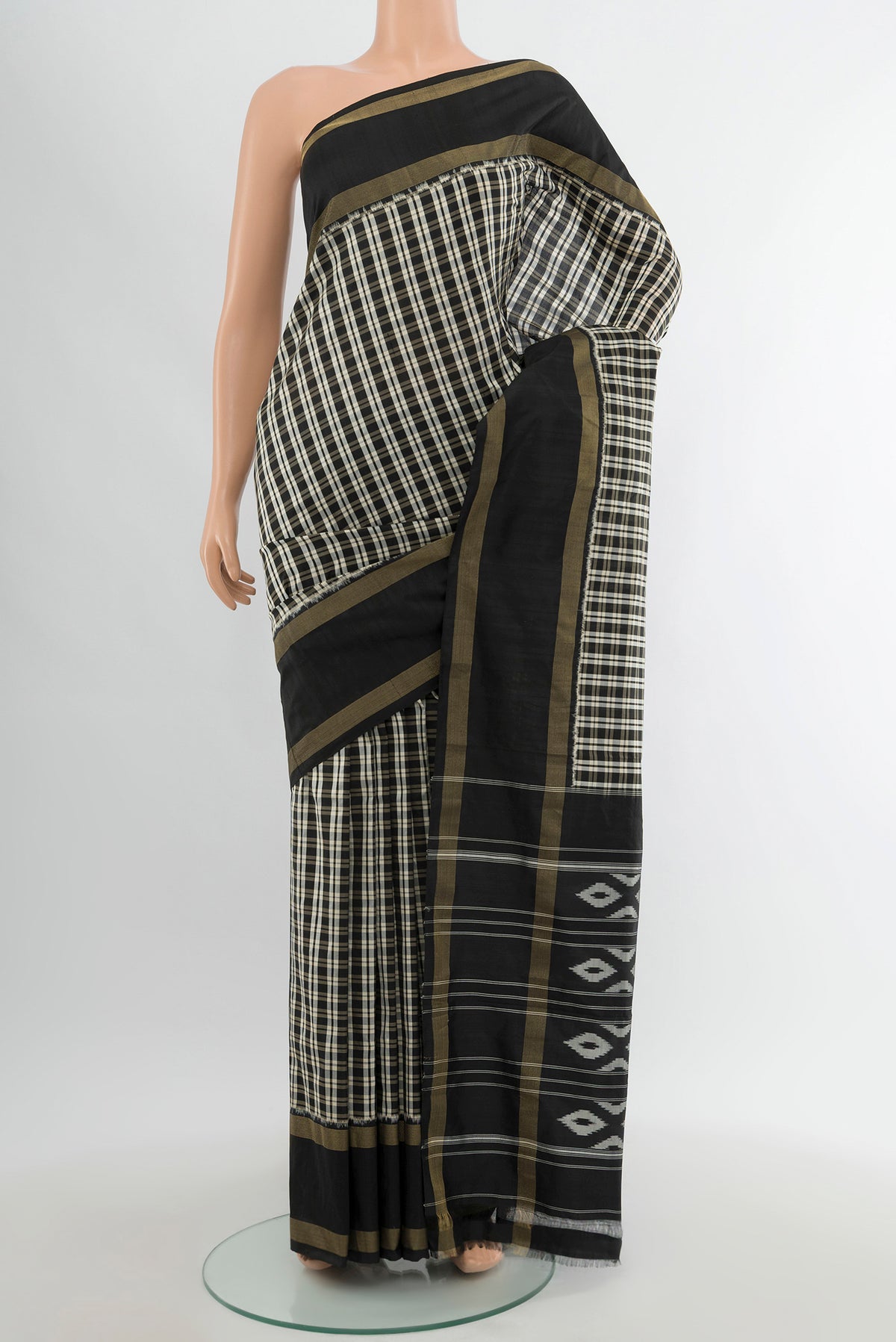 Multi Color Pochampally Silk Saree with Checked design on the body and Zari Border.  displayed on a mannequin
