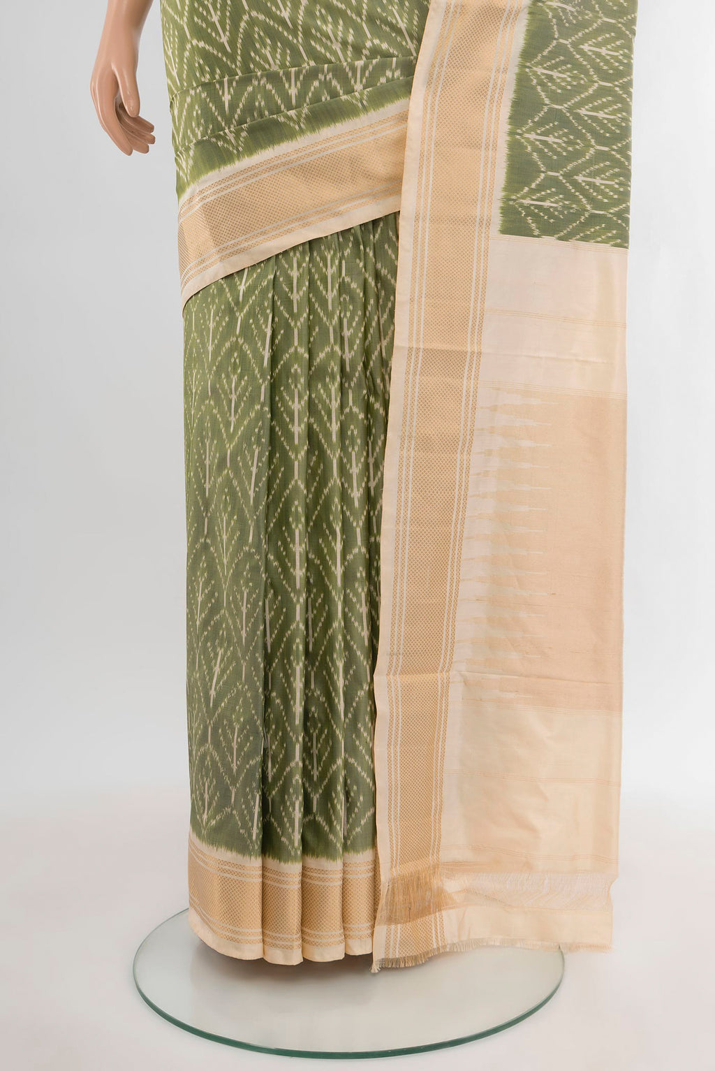 Pleats and pallu of Sage Green Pochampally Silk Saree with Pure Ikat on the body and Zari Border. 