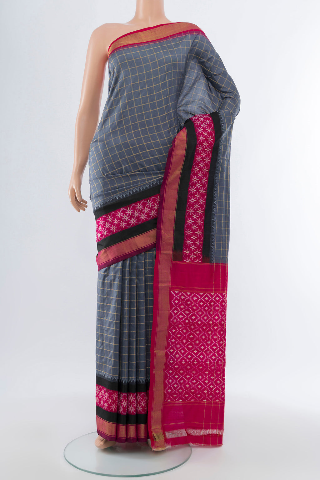 Davys Grey Pochampally Saree with Ikat Print on the body and Silk Border.  displayed on a mannequin