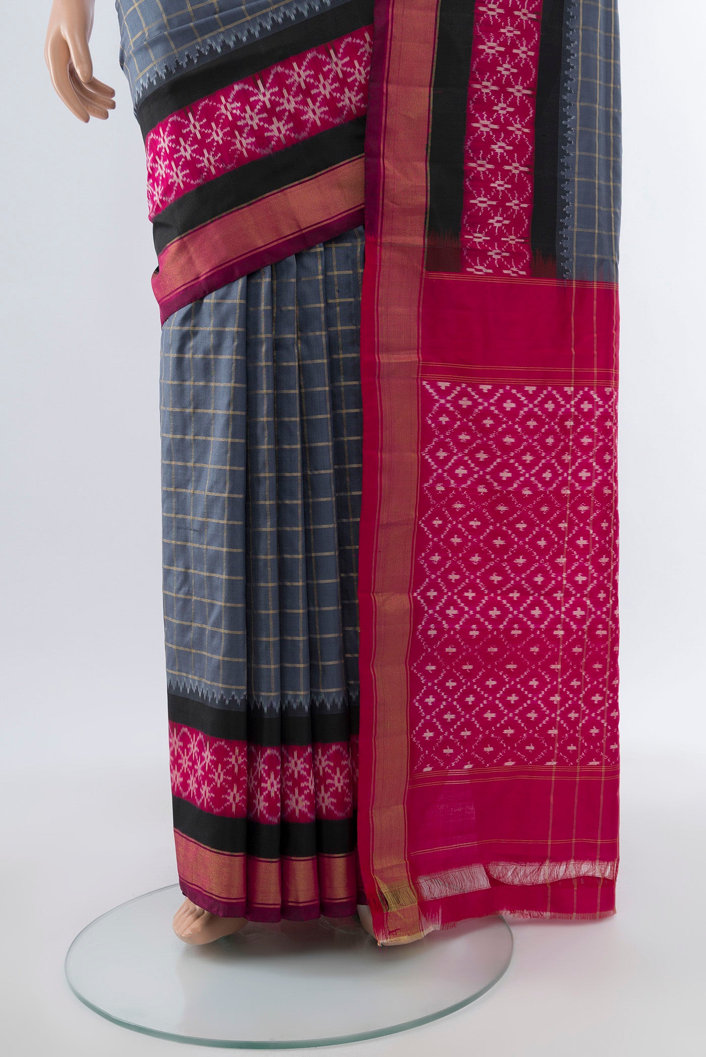 Pleats and pallu of Davys Grey Pochampally Saree with Ikat Print on the body and Silk Border. 