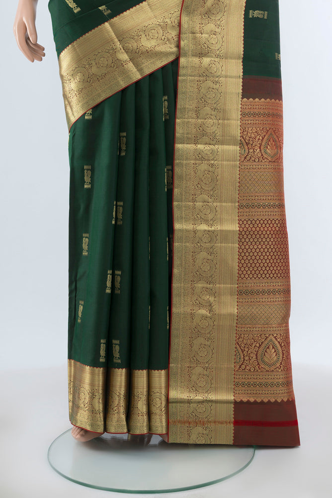 Pleats and pallu of Mint Green Kanjivaram Silk Saree with Plain Body and Silk Border. 