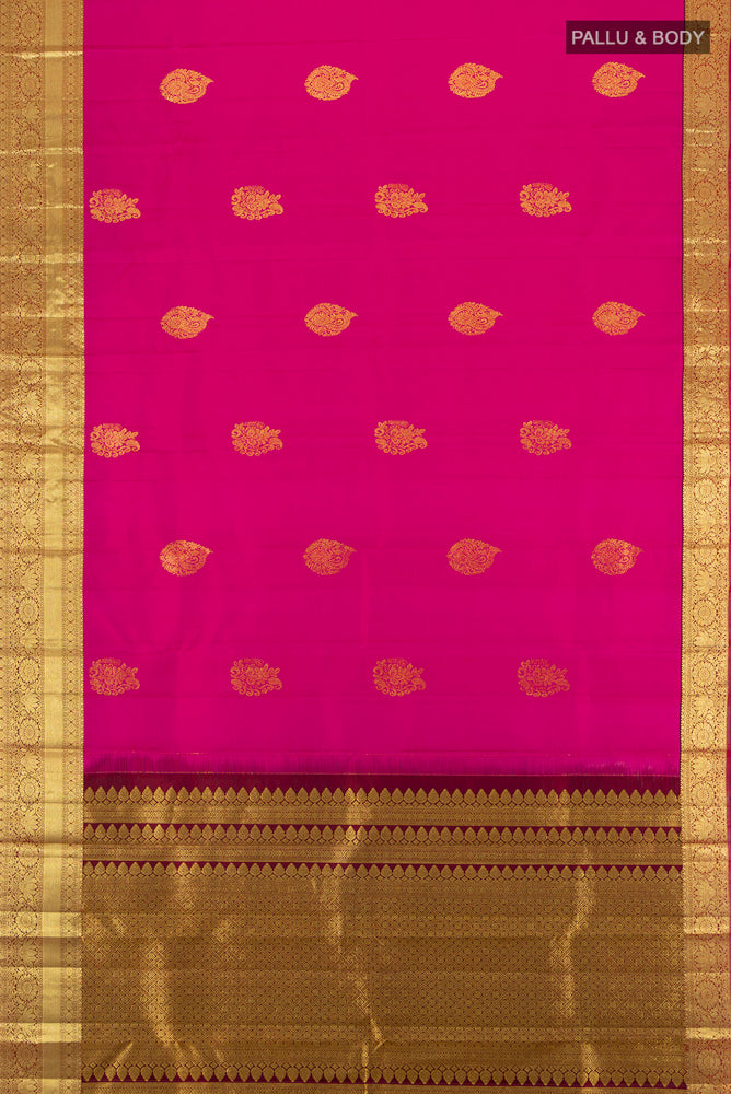 Flat view of Dark Pink Kanchipuram Silk Saree with Zari Butta on the body and Silk Border. 