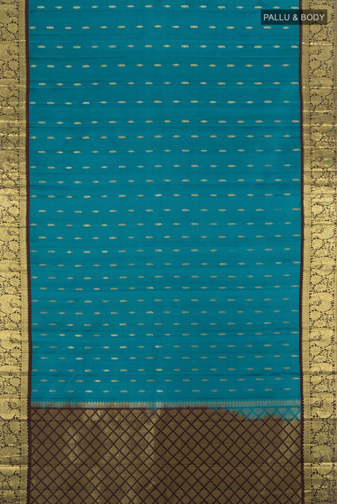 Flat view of Pure Silk Pure Zari Dark Blue Kanchipuram Saree with Zari Butta on the body and Silk Border. 