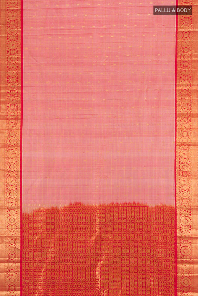 Flat view of Peach Kanchipuram Silk Saree with Zari Butta on the body and Silk Border. 
