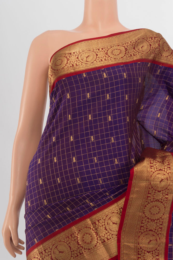 Border image of Violet Kanchipuram Silk Saree with Zari Brocade on the body and Silk Border. 