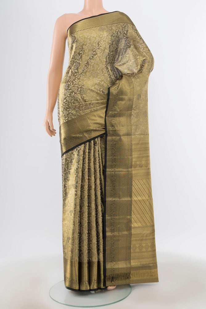 Pure Silk Pure Zari Golden Kanjivaram Saree with Zari Butta on the body and Silk Border.  displayed on a mannequin