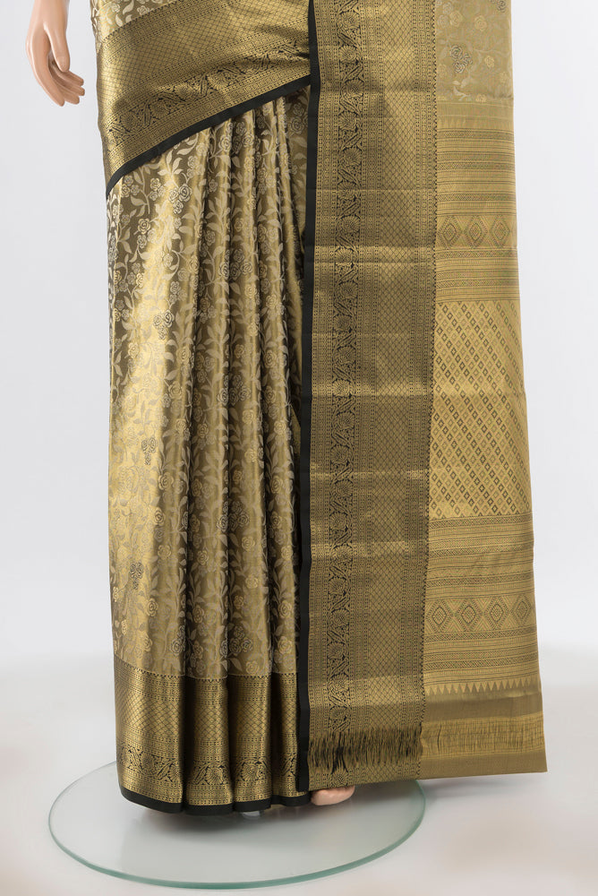 Pleats and pallu of Pure Silk Pure Zari Golden Kanjivaram Saree with Zari Butta on the body and Silk Border. 