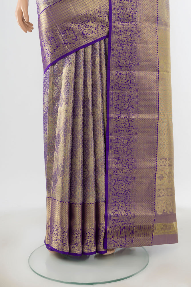 Pleats and pallu of Golden Kanjivaram Silk Saree with Plain Body and Silk Border. 