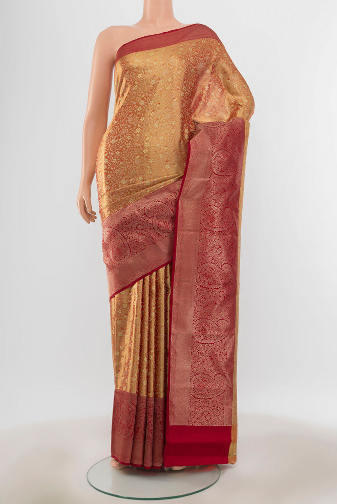Pure Silk Pure Zari Golden Kanjivaram Saree with Zari Butta on the body and Silk Border.  displayed on a mannequin