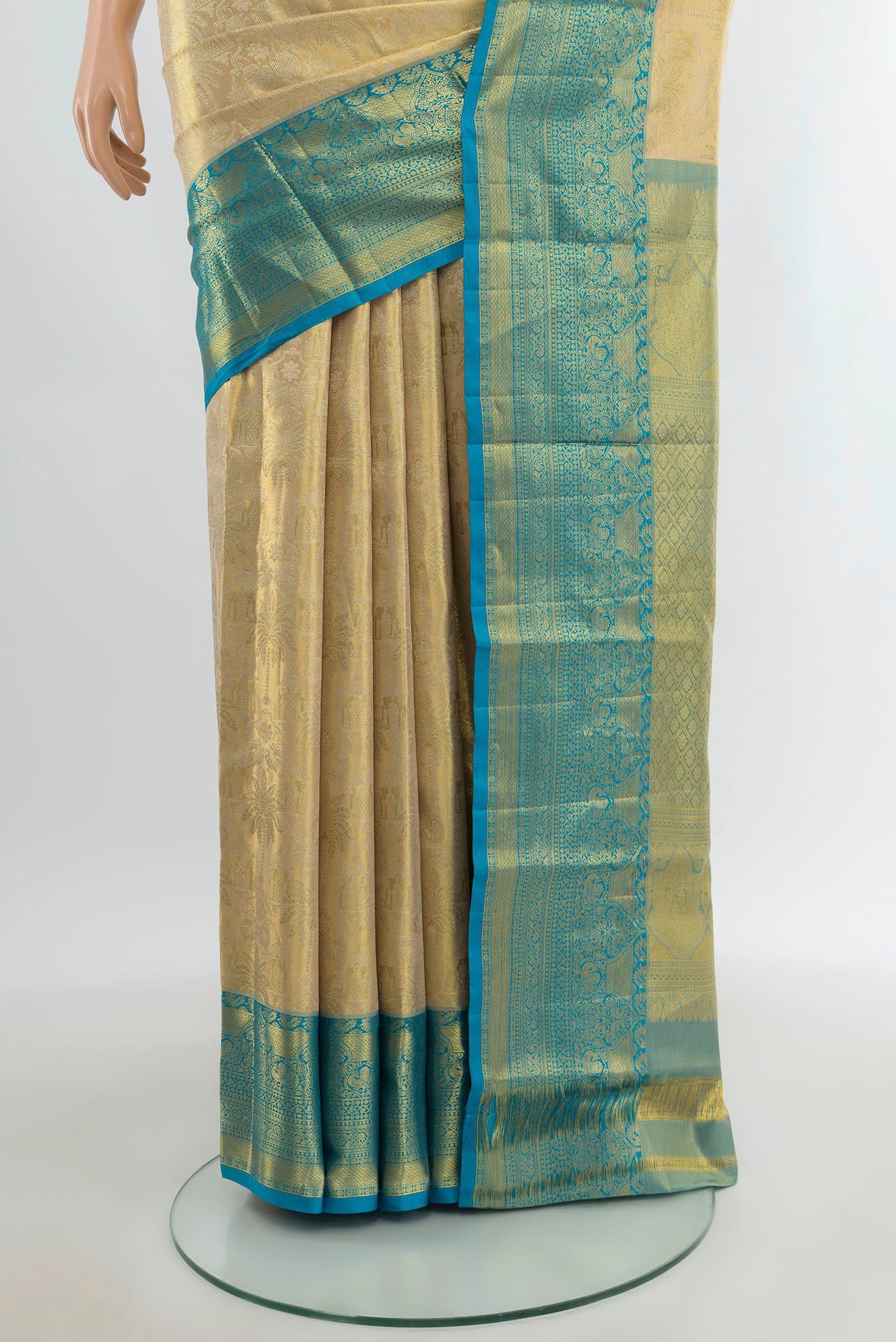 Pleats and pallu of Golden Kanchipuram Tissue Silk Saree with Zari Brocade on the body and Zari Border. 