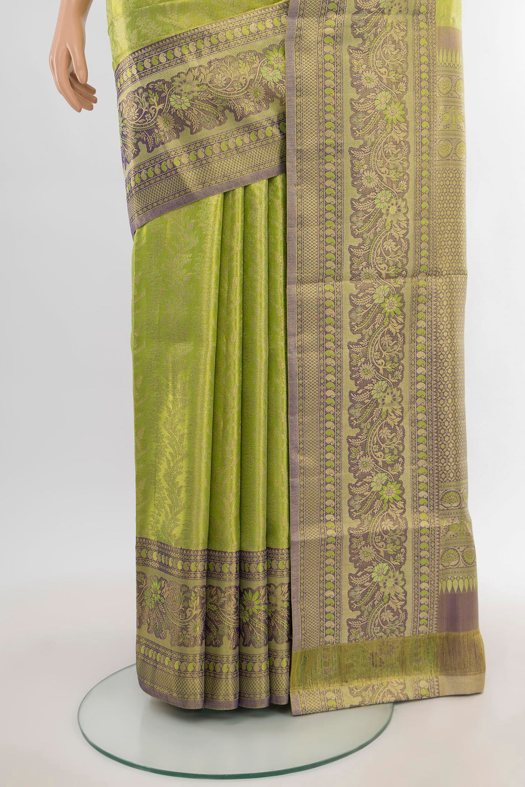 Pleats and pallu of Parrot Green Kanchipuram Tissue Silk Saree with Zari Brocade on the body and Zari Border. 
