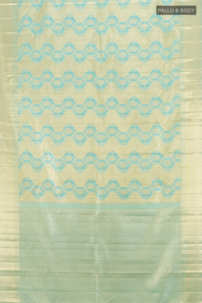 Flat view of Golden Kanjivaram Silk Saree with Zari Butta on the body and Silk Border. 
