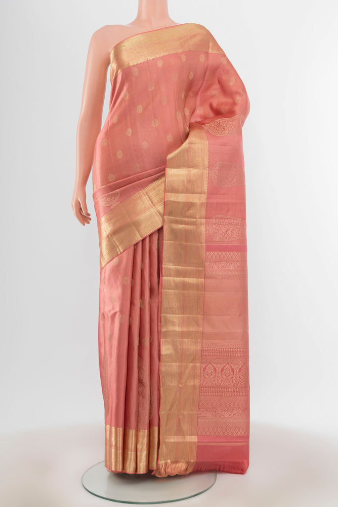 Rose pink Kanjivaram Silk Saree with Zari Butta on the body and Silk Border.  displayed on a mannequin