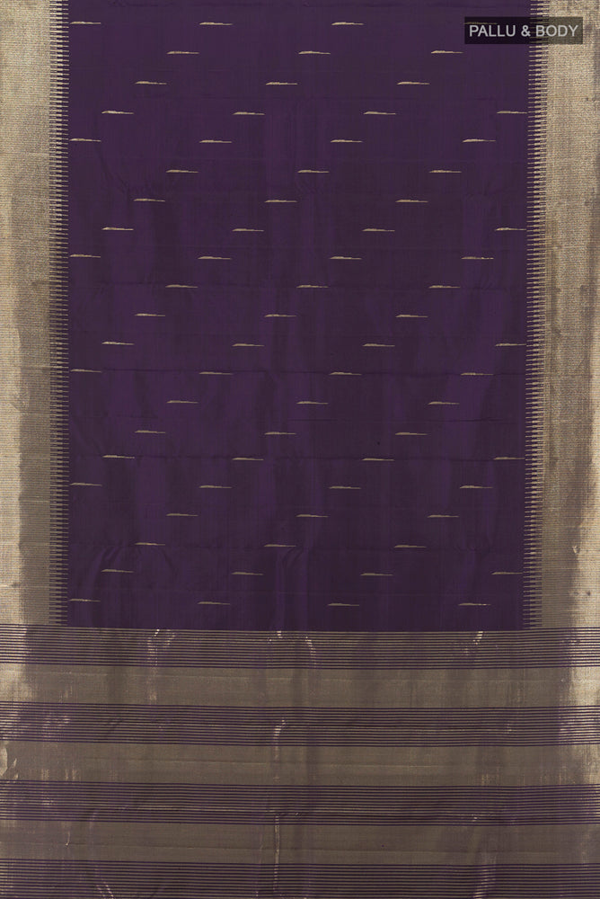 Flat view of Violet Kanchipuram Silk Saree with Zari Butta on the body and Silk Border. 