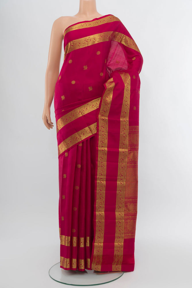 Maroon Kanjivaram Silk Saree with Zari Brocade on the body and Zari Border.  displayed on a mannequin