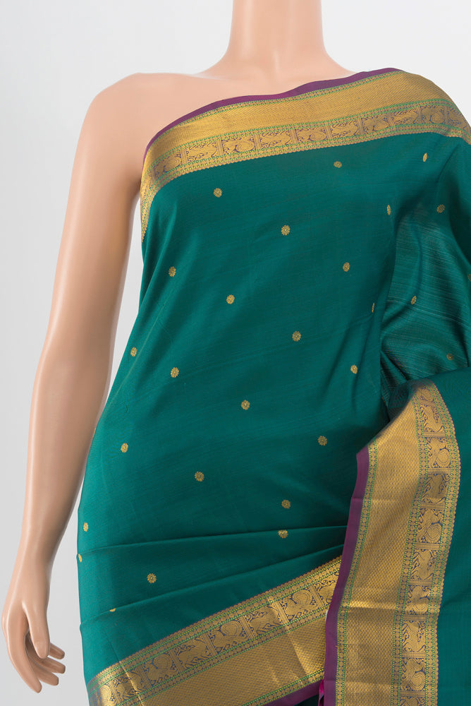 Border image of Pure Silk Pure Zari Peacock Blue Kanjivaram Saree with Zari Butta on the body and Silk Border. 