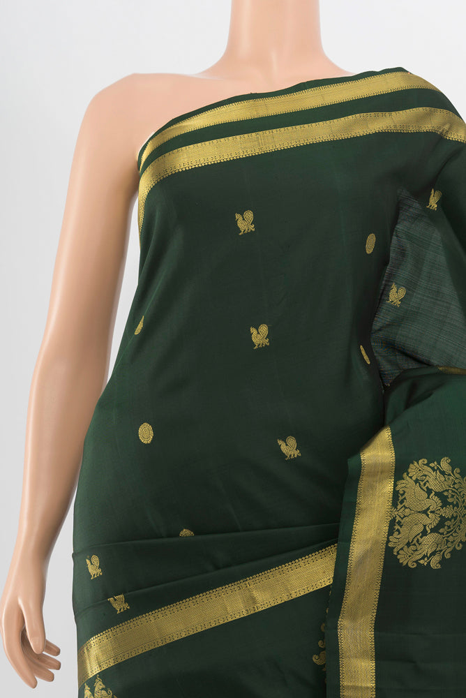 Border image of Pure Silk Pure Zari Bottle Green Kanjivaram Saree with Zari Butta on the body and Silk Border. 