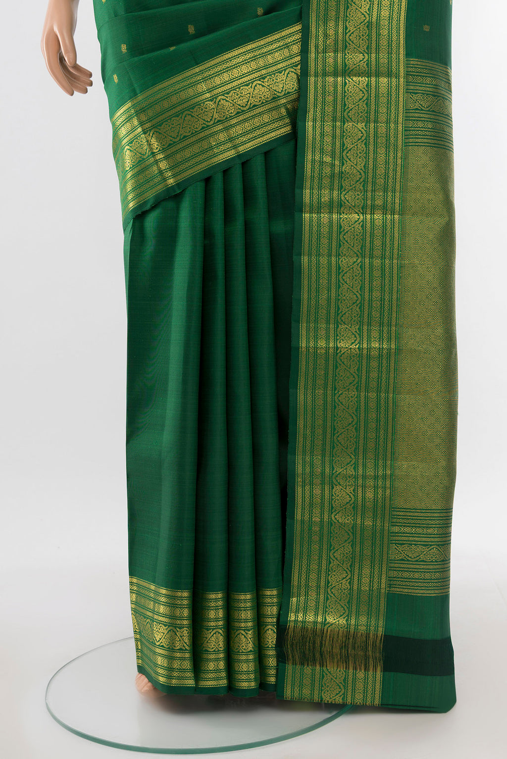 Pleats and pallu of Pure Silk Pure Zari Mint Green Kanjivaram Saree with Zari Butta on the body and Silk Border. 