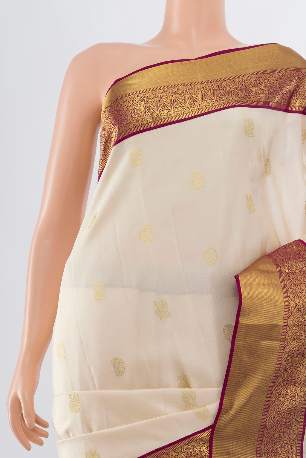 Border image of Pure Silk Pure Zari Cream Kanjivaram Saree with Zari Butta on the body and Silk Border. 
