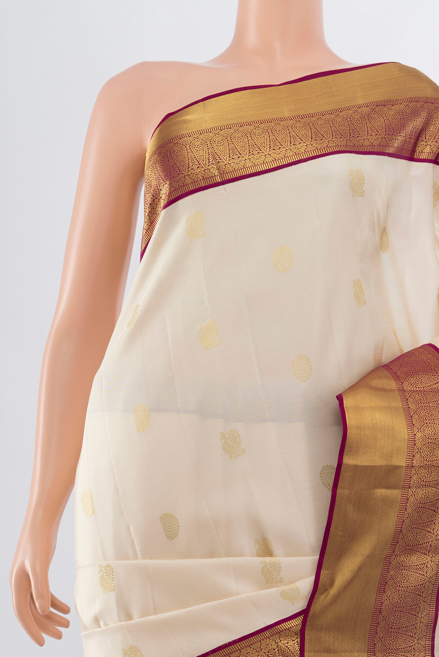 Border image of Pure Silk Pure Zari Cream Kanjivaram Saree with Zari Butta on the body and Silk Border. 
