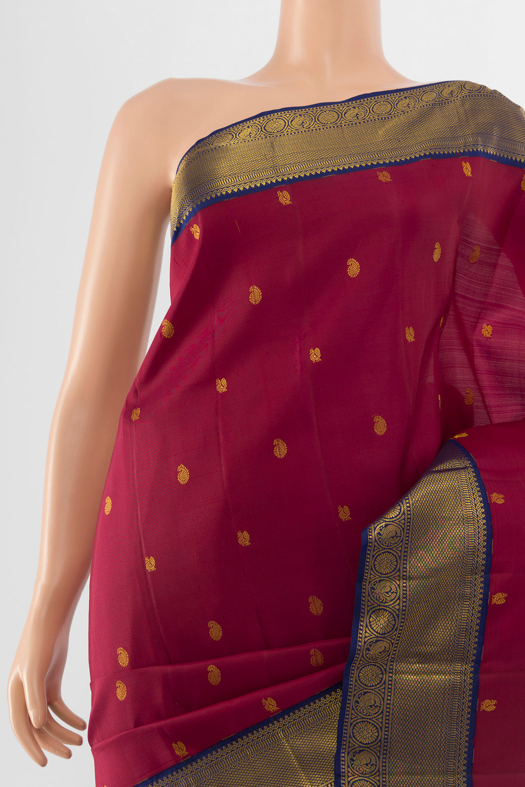 Border image of Pure Silk Pure Zari Maroon Kanjivaram Saree with Zari Butta on the body and Silk Border. 