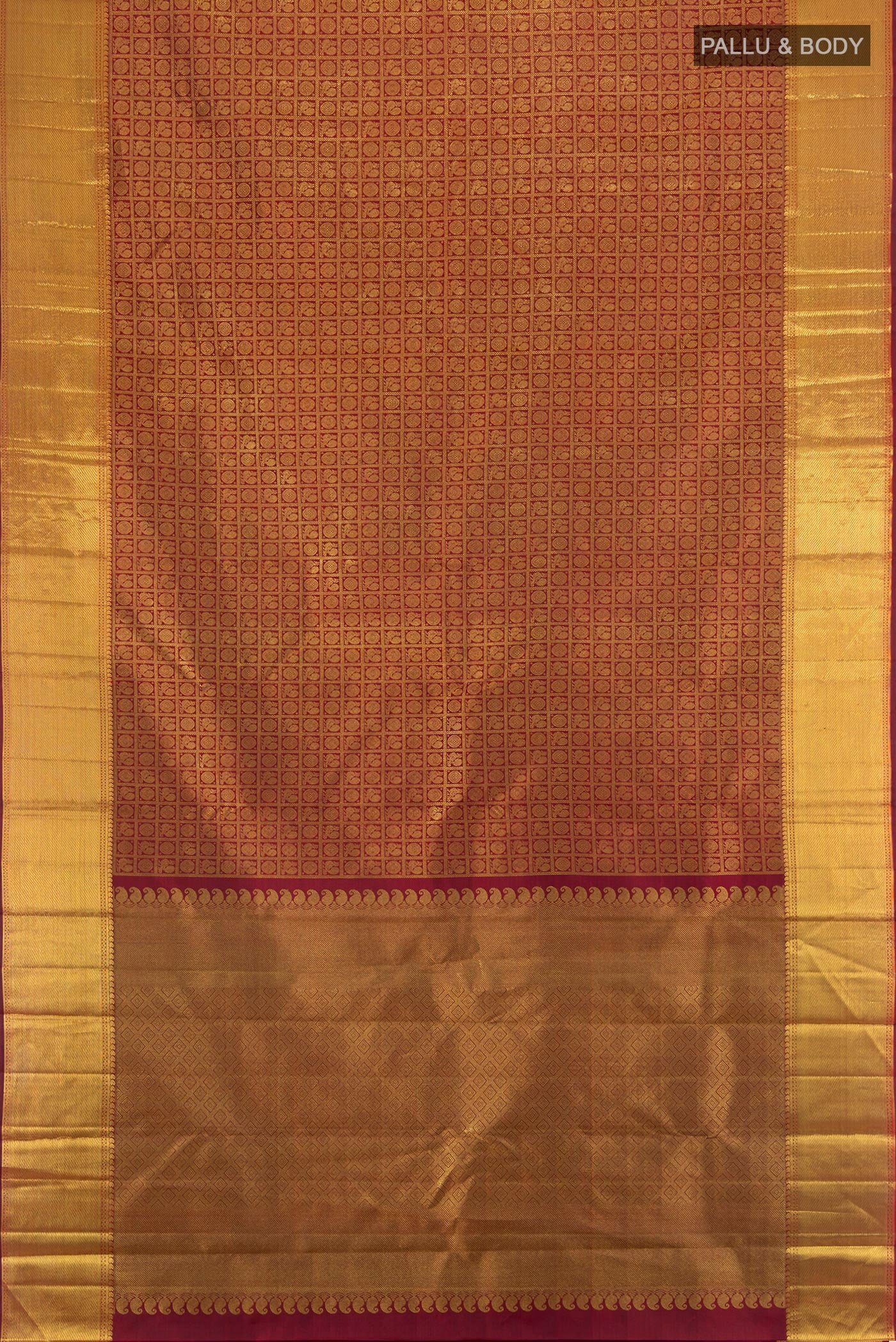 Flat view of Pure Silk Pure Zari Maroon Kanjivaram Saree with Zari Brocade on the body and Zari Border. 