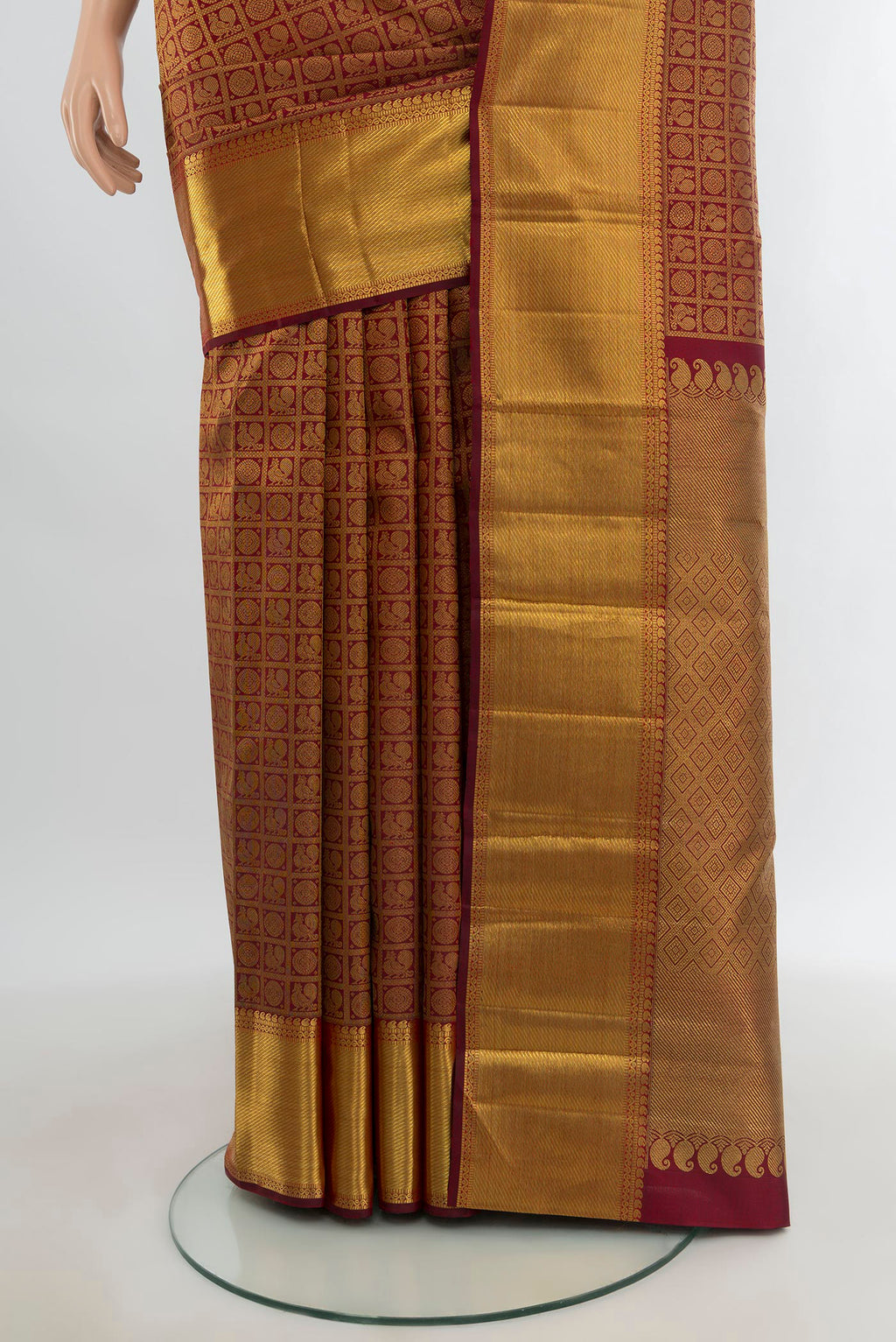 Pleats and pallu of Pure Silk Pure Zari Maroon Kanjivaram Saree with Zari Brocade on the body and Zari Border. 