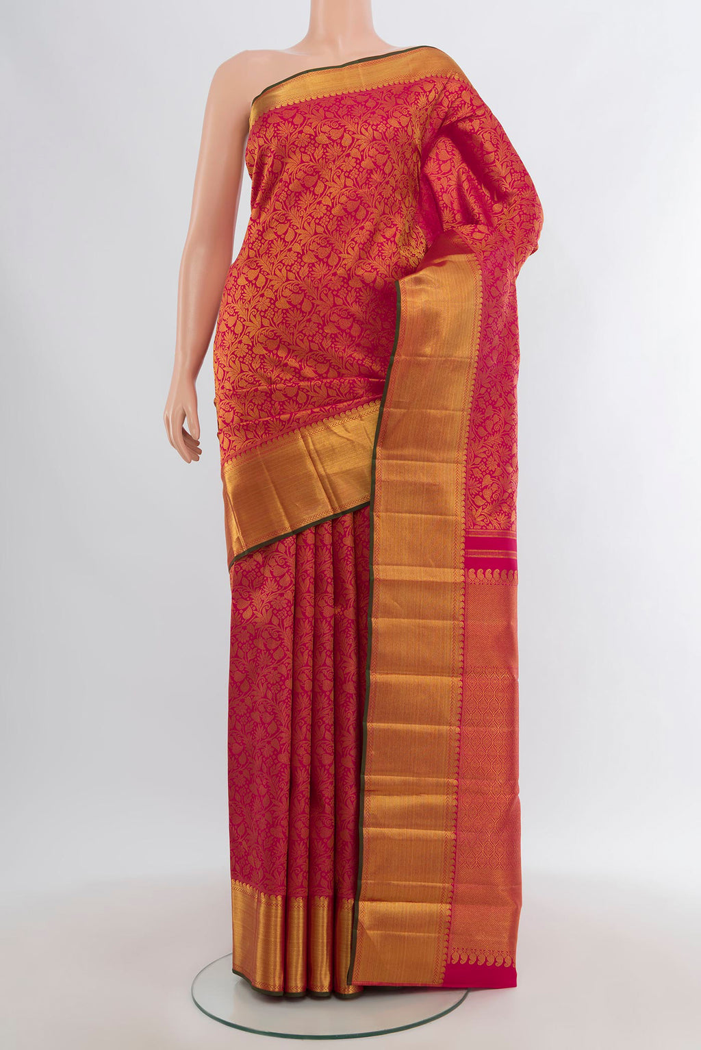 Pure Silk Pure Zari Pink Kanjivaram Saree with Zari Brocade on the body and Zari Border.  displayed on a mannequin